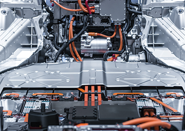 Close-up view of an lithium battery pack and power connections for an electric car. 