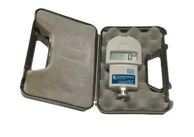 Image shows vacuum gage with digital screen showing 0, inside an open padded case.