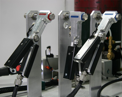 Three CTS Nitrogen Purge Clamshells clamped on a fixture.