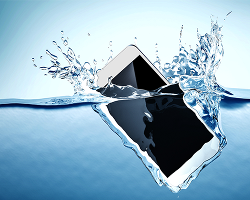 Image shows cell phone falling into water with a splash.