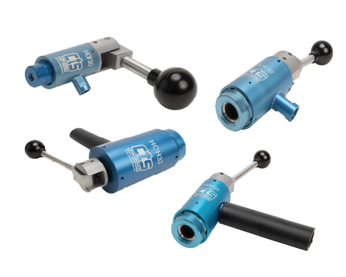  Image shows four HO-style manual connectors, two with fill ports and two with ergonomic handles.